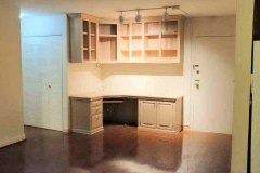 922TwentyFourthStNW#405-lr-main-door-builtin-desk-bookcases